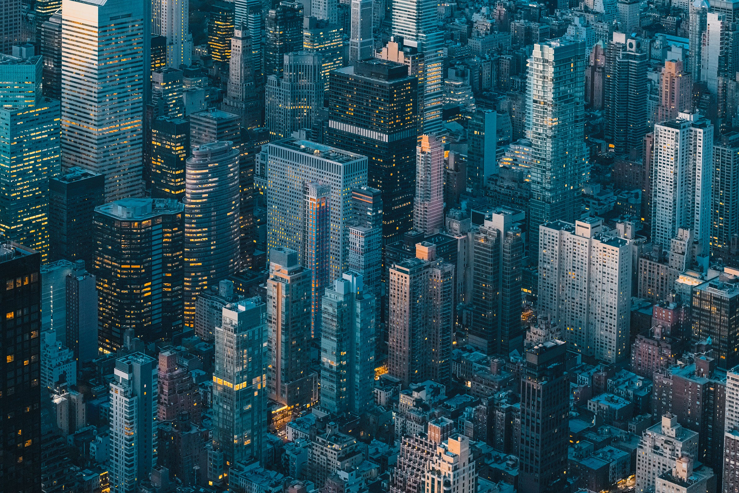 an aerial view of a city at night