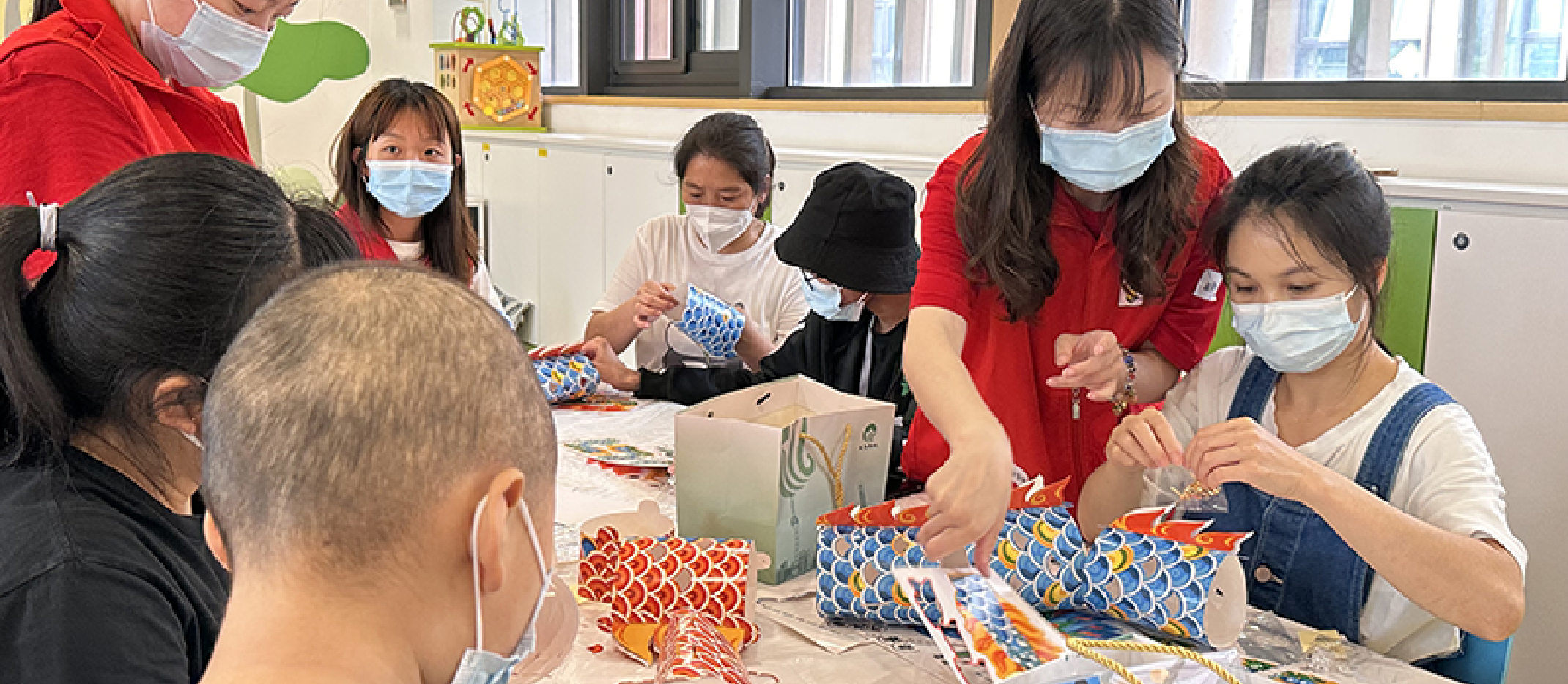 UL Solutions employees helping to wrap presents